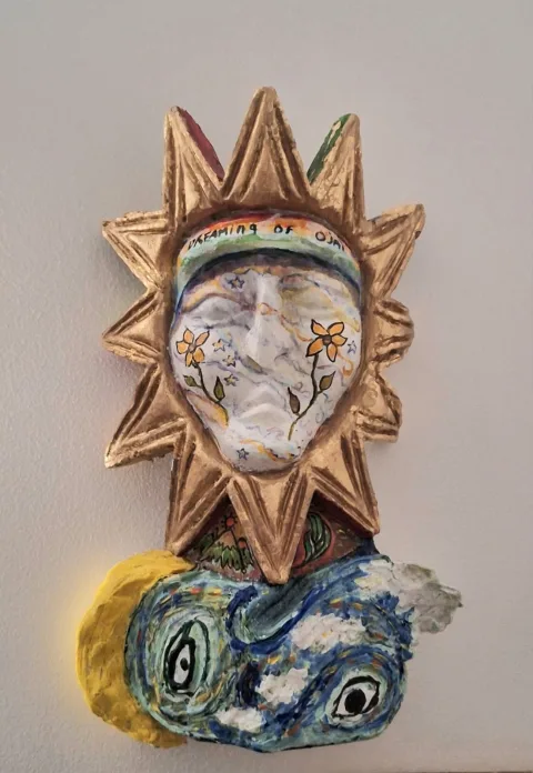 Dreaming of Ojai — Ericco Studio's "Dreaming of Ojai" sculpture honors Chumash heritage, using a sun crown and swirling blue clouds and eyes  to represent  the people's spirit watching over the land and  word "Ojai" meaning  moon.
https://youtu.be/sdleIe